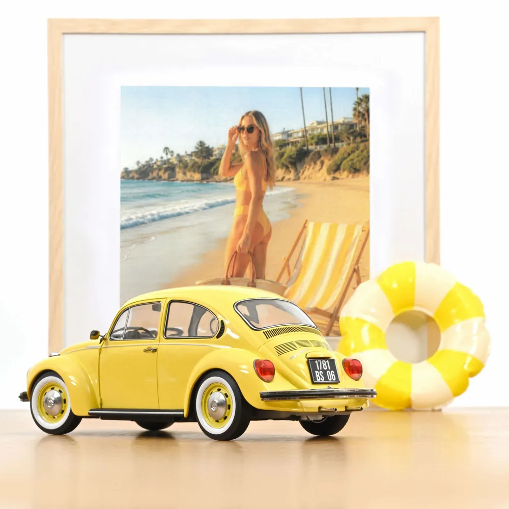 Cadeaux - Voiture miniature VW 1303 1973 Jaune pastel 1/18 - NOREV