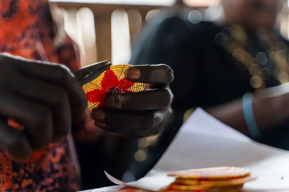 Christmas garlands and baubles - Hand Beaded Blossom of Hope Christmas Ornament - UNHCR/MADE51