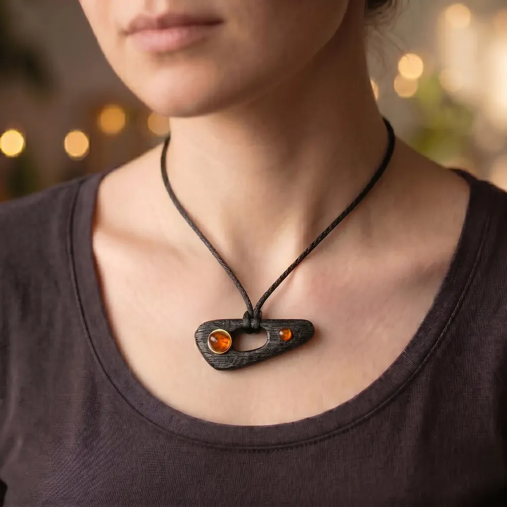 Jewelry - Bog Oak & Baltic Amber Pendant – Black, 55x25x8 mm – Shield of Time - GLASS4CANDLES
