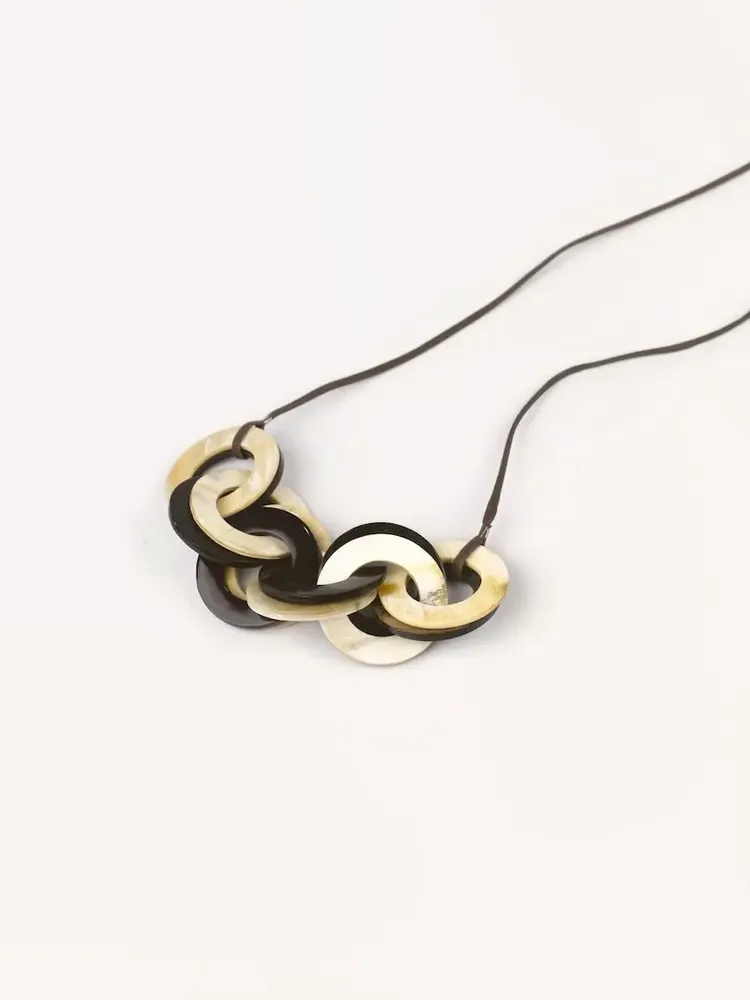 Jewelry - Interlaced rings pendant in blond and black horn - L INDOCHINEUR X RIVÊT