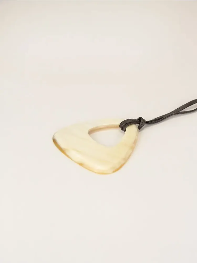 Jewelry - Openwork triangle pendant in blond horn - L INDOCHINEUR X RIVÊT