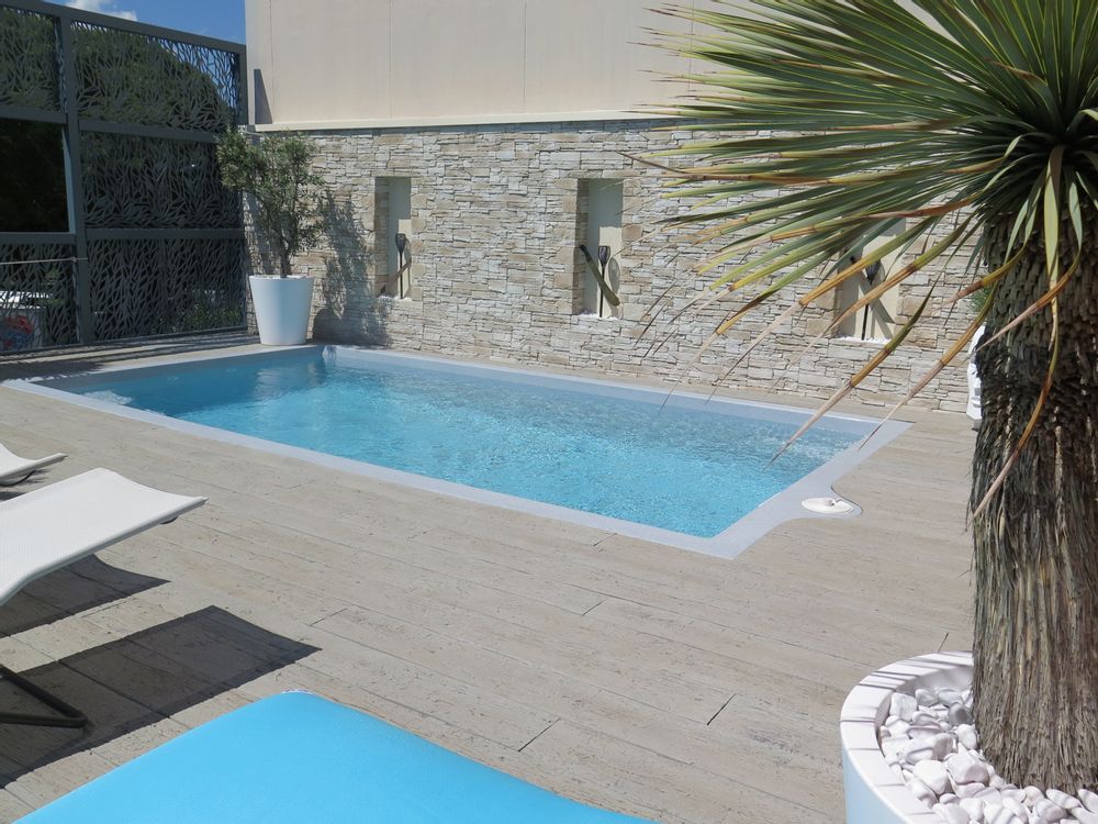 Systèmes de terrasse - Lames de terrasse en résine minérale ANSYEARS MILLBOARD - ANSYEARS TERRASSES D'EXCEPTION