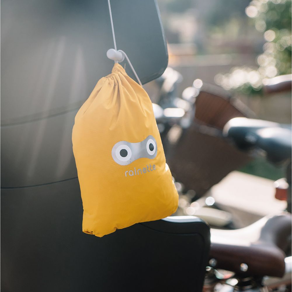 Mode enfantine - L'imperméable pour siège de vélo - RAINETTE
