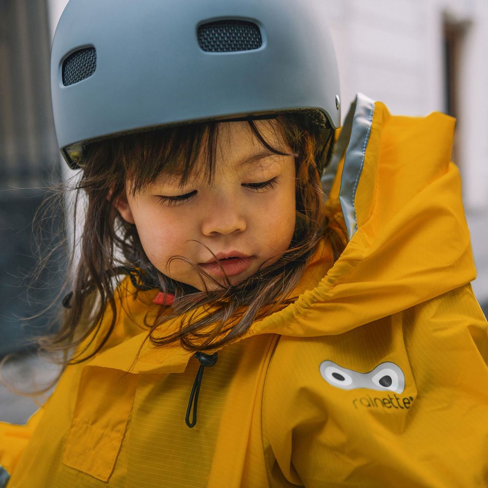 Mode enfantine - L'imperméable pour siège de vélo - RAINETTE