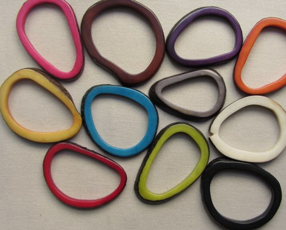 Quincaillerie d'art - Calamar grand en Tagua. Ivoire végétal - TIERRATAGUA & CREATIERRA