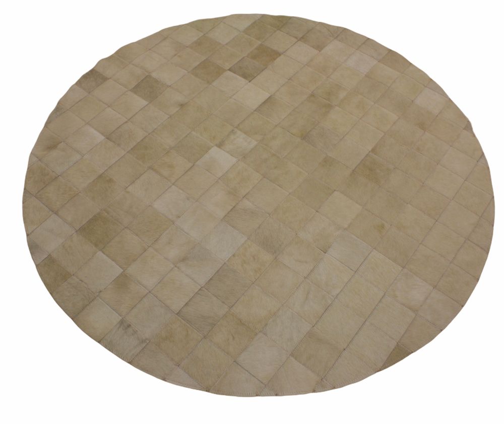 Bespoke carpets - tapis rond en peau de vache  - TERGUS