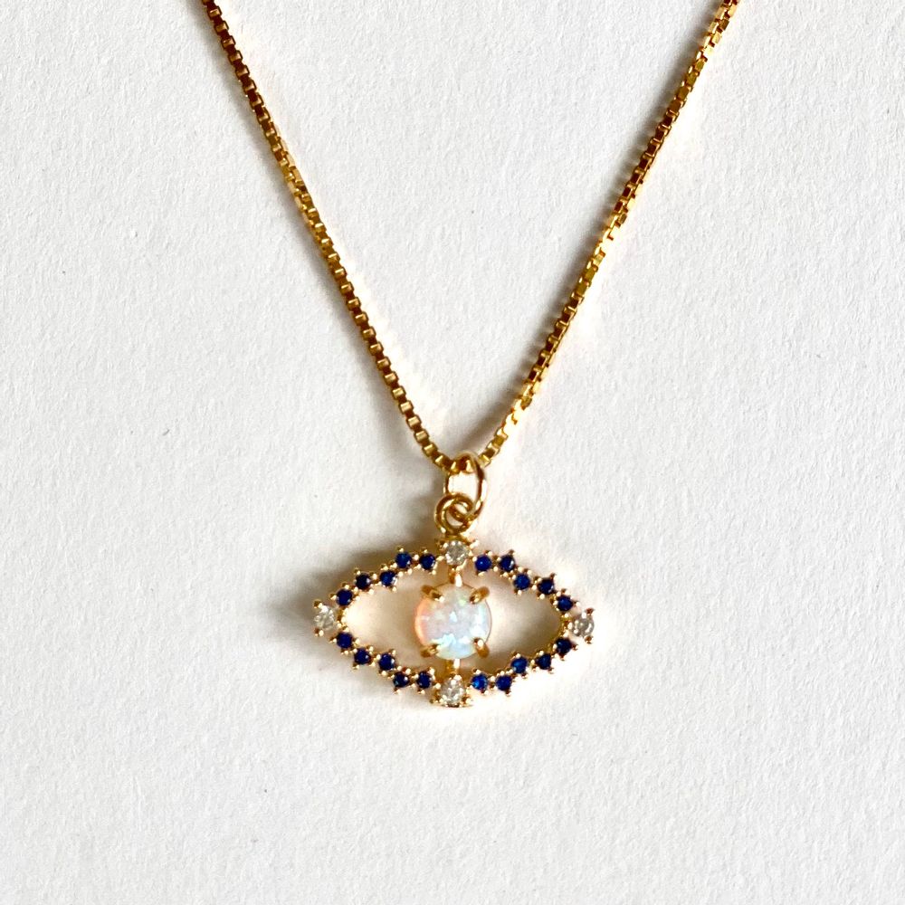 Bijoux - Collier oeil, dorées à l'or fin avec petites pierres colorées.  - NAO JEWELS