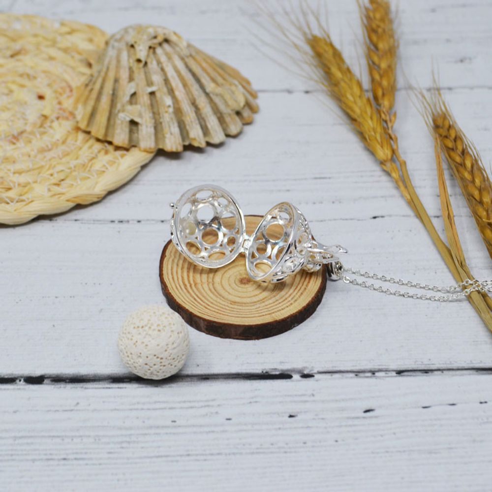 Diffuseurs de parfums - Collier diffuseur cage argent - ANDREA (chaine sautoir/bille lave blanche) - IRRÉVERSIBLE