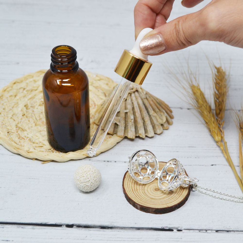 Diffuseurs de parfums - Collier diffuseur cage argent - ANDREA (chaine sautoir/bille lave blanche) - IRRÉVERSIBLE