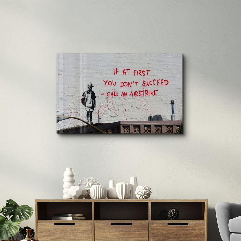 Other wall decoration - Banksy - Call an Airstrike | Glass Wall Art  110CMx70CM - ARTDESIGNA