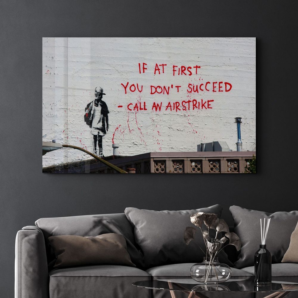 Other wall decoration - Banksy - Call an Airstrike | Glass Wall Art  110CMx70CM - ARTDESIGNA