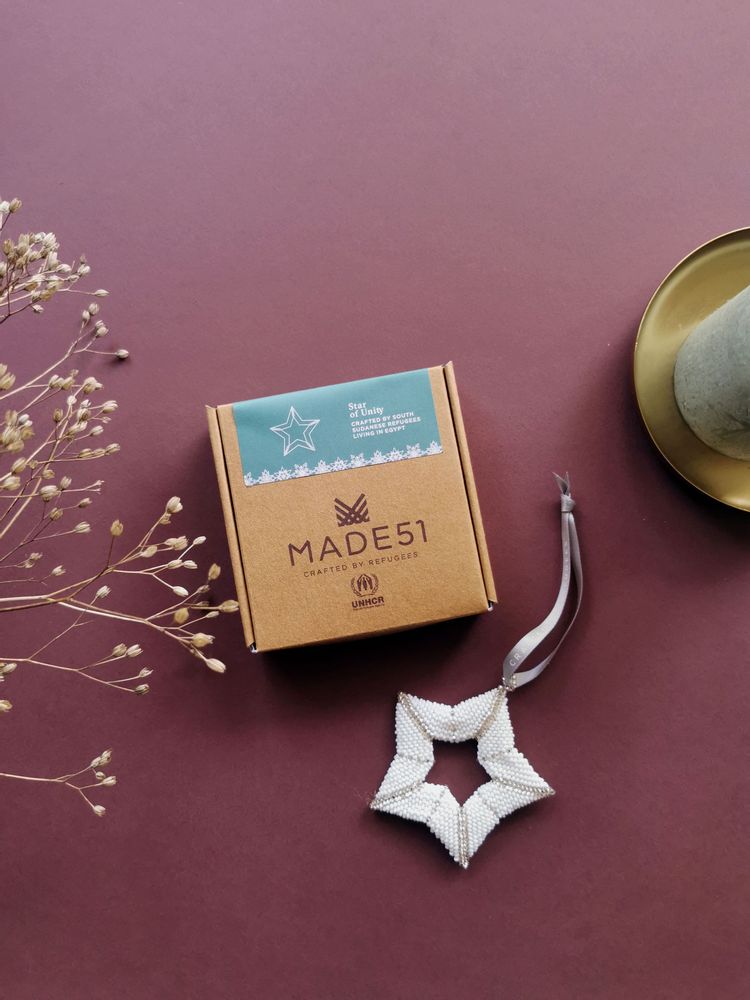 Guirlandes et boules de Noël - Étoile de l'unité - Décoration - UNHCR/MADE51