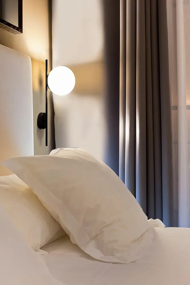 Wall lamps - LYMINGTON wall lamp with opalised globe and black/gold structure - LUXCAMBRA