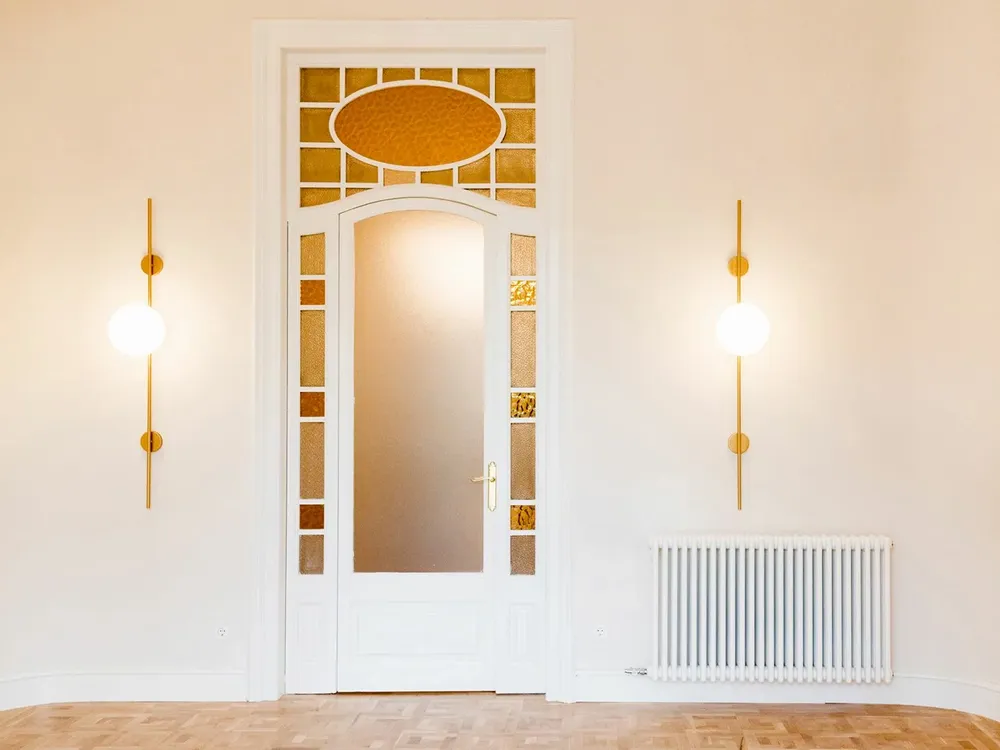 Wall lamps - LYMINGTON wall lamp with opalised globe and black/gold structure - LUXCAMBRA