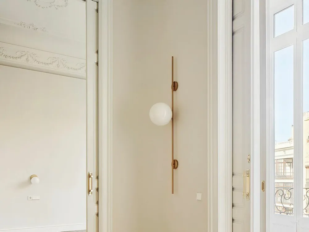 Wall lamps - LYMINGTON wall lamp with opalised globe and black/gold structure - LUXCAMBRA