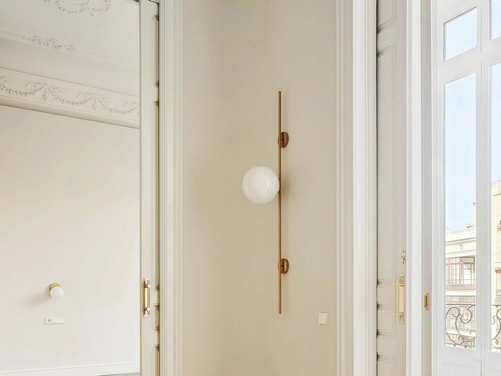 Wall lamps - LYMINGTON wall lamp with opalised globe and black/gold structure - LUXCAMBRA