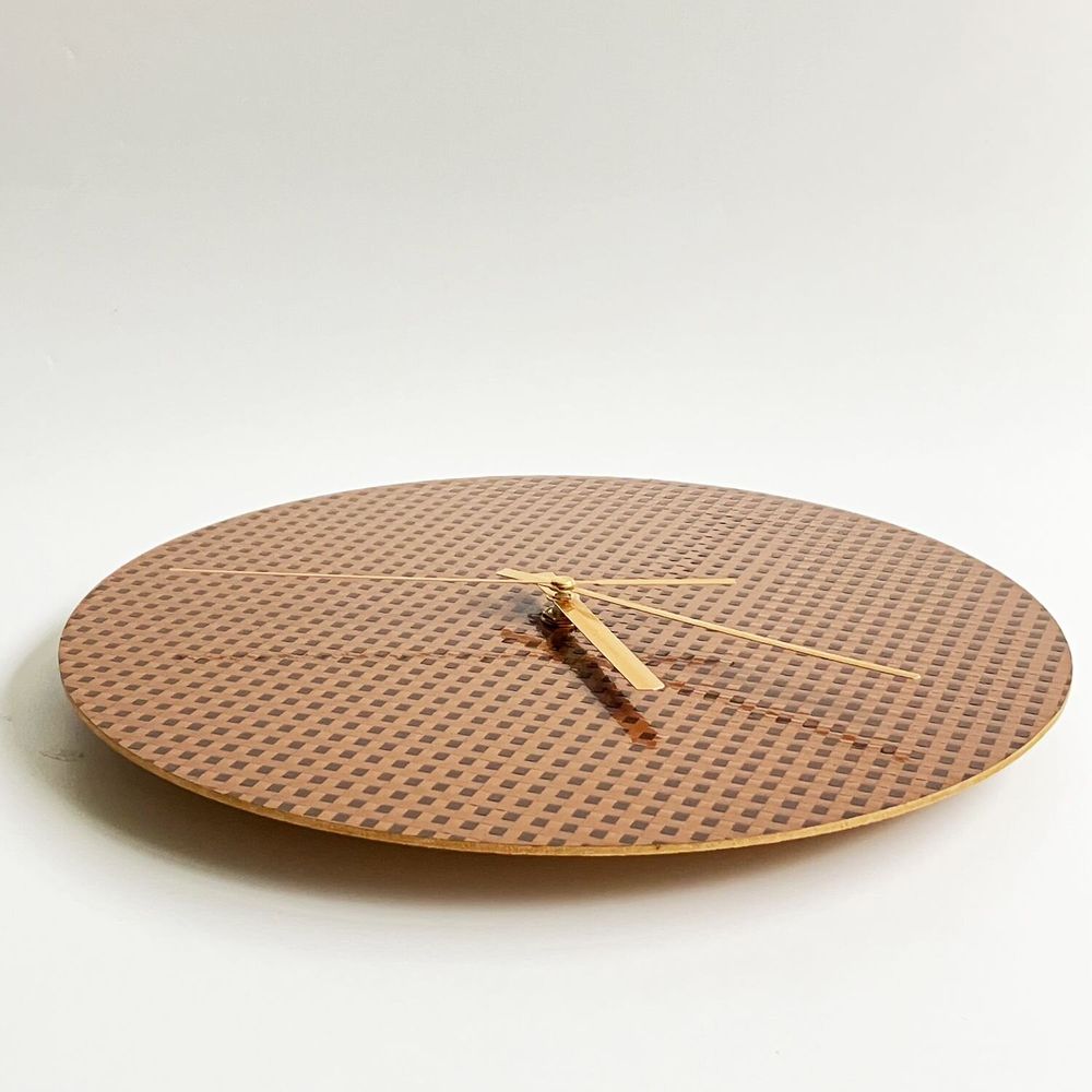 Aménagements pour bureau - L'horloge MusicCloth® tourne dans le sens inverse - REHYPHEN