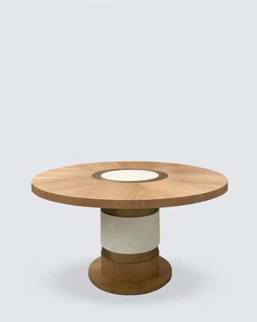 https://mom.maison-objet.com/en/product/1721156/lune-table-in-gold-limed-oak-brass-and-leather