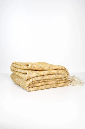 https://mom.maison-objet.com/en/product/1747986/alpaca-weighted-throw-lineo-natural-gold